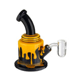 Eyce Oraflex Silicone Dab Rig in yellow with black accents, 5" tall, 10mm female joint, side view