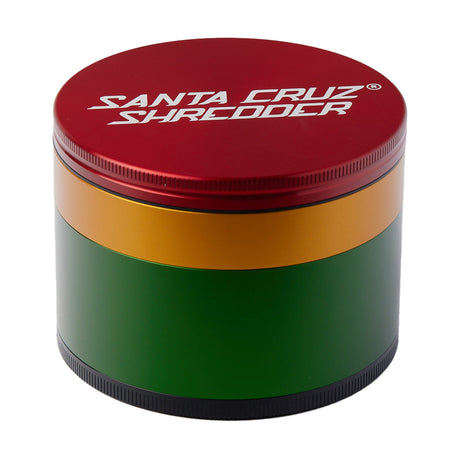 Santa Cruz Shredder Large 4 Piece Grinder in Rasta colors front view on white background