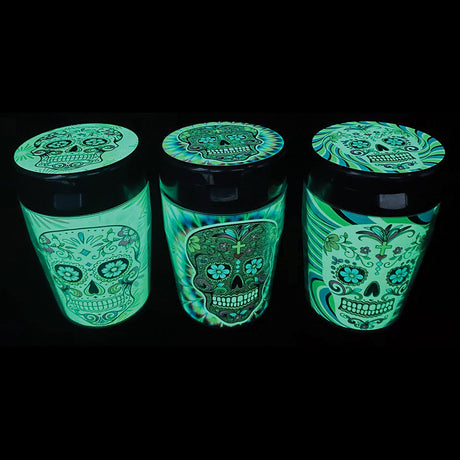Fujima Glow Car Ashtrays with Lids featuring assorted skull designs in a 6pc display, perfect for travel