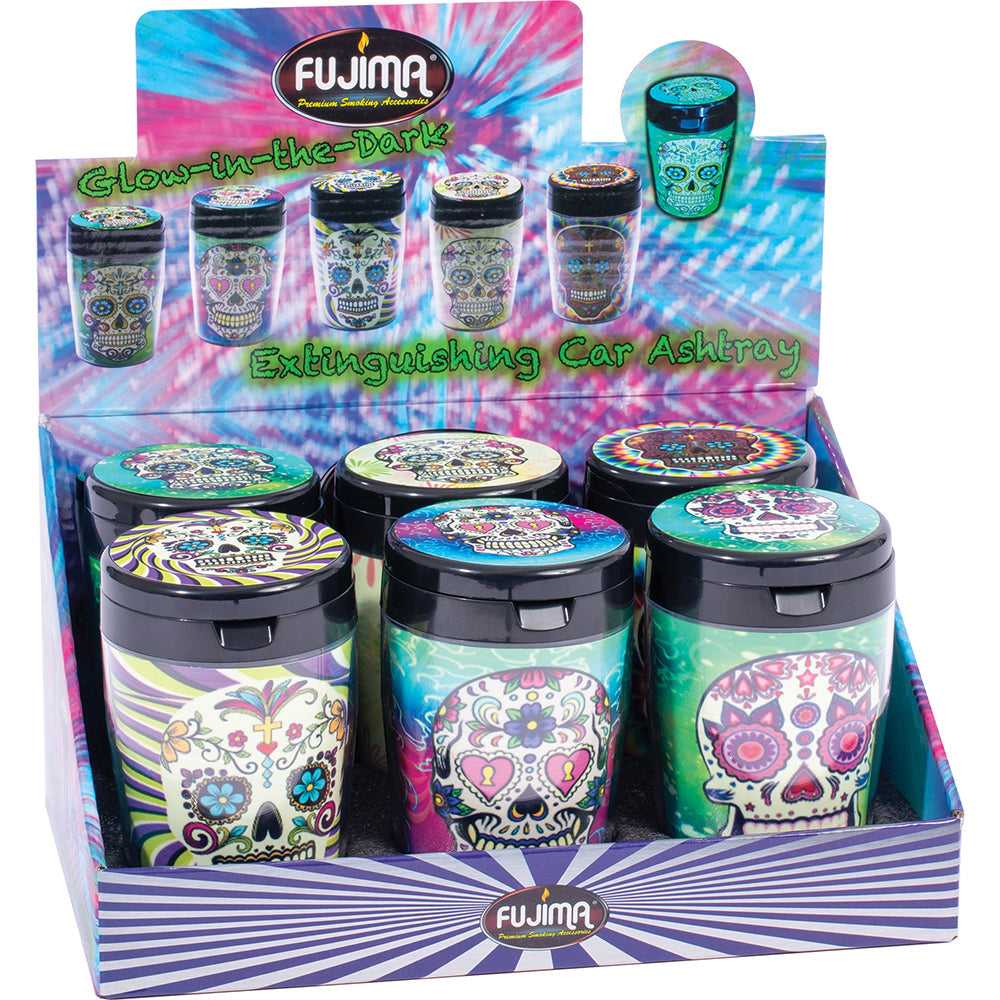 Fujima Glow Car Ashtray display with assorted styles, featuring glow-in-the-dark lids and skull designs