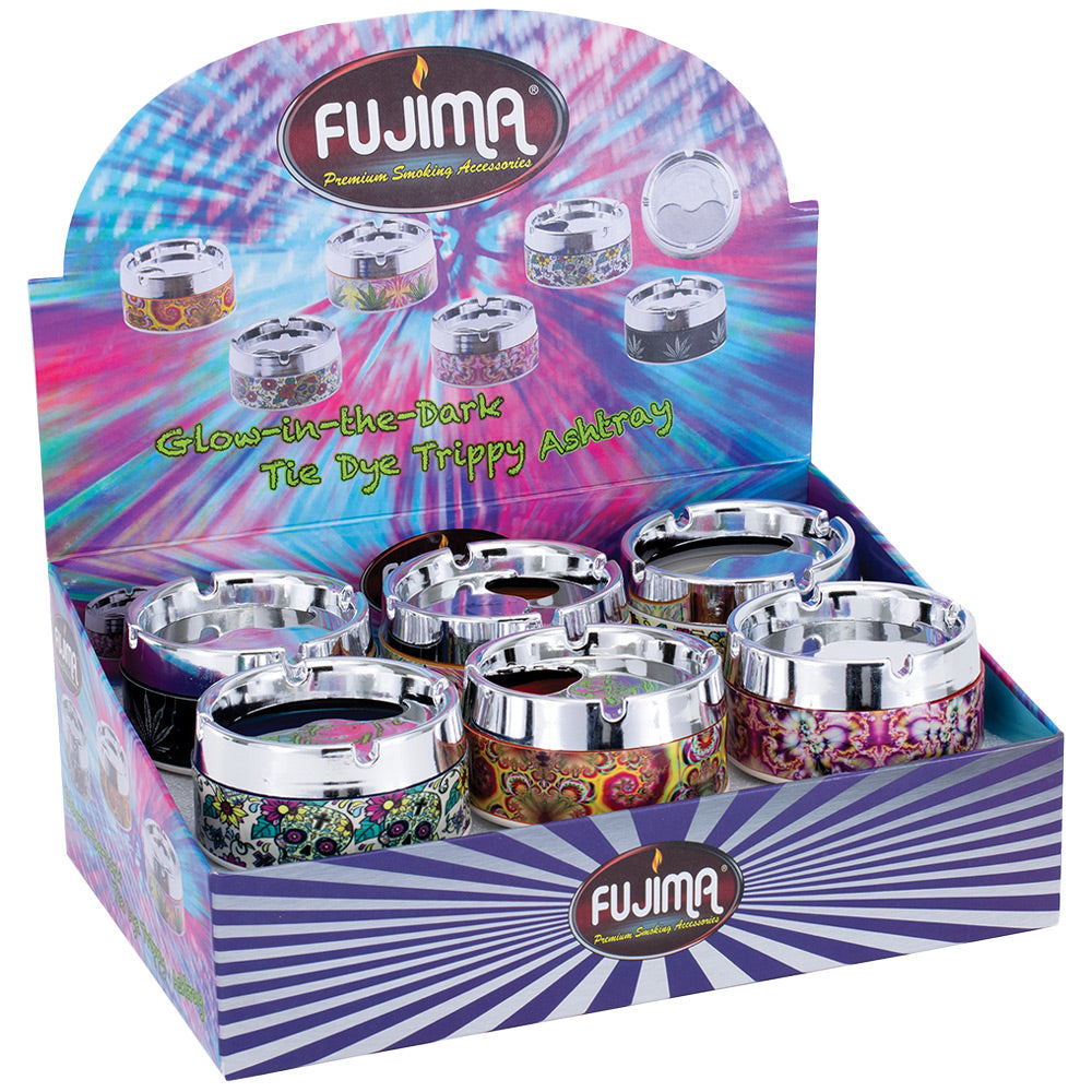 Fujima Trippy Glow Ashtrays on display, 3.5" assorted psychedelic designs, glow-in-the-dark feature