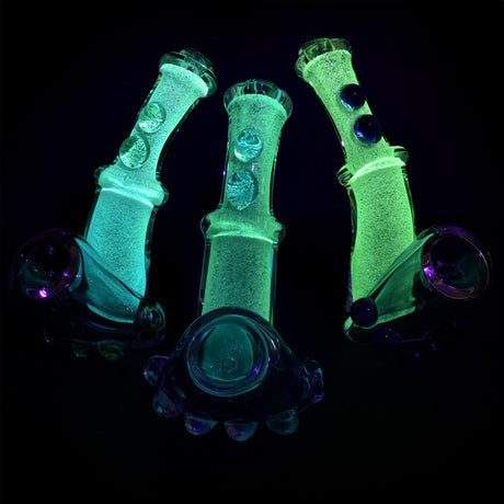 Glow Aurora Sherlock Hand Pipes glowing in the dark, 4.5" borosilicate glass, front view