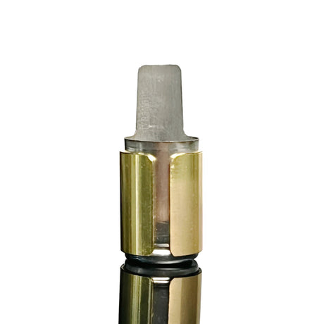 Golden Thermal Sleeve for DynaVap by The Stash Shack, close-up on a white background
