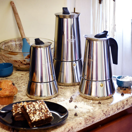 Herbal Chef Stove Top Butter Infusers in three sizes on kitchen counter with treats