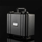 Ispire daab Induction eRig Kit case front view on reflective surface, portable and durable design