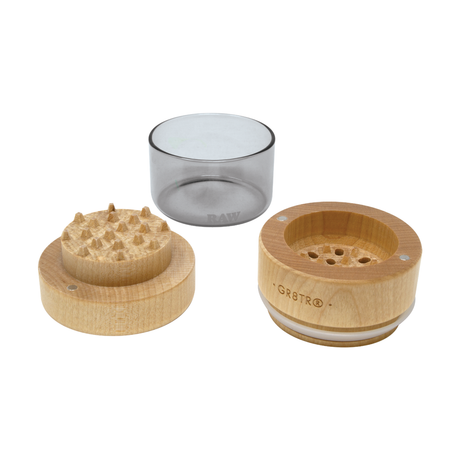 RAW Pressed Wood Grinder next to Glass Jar, 65mm, Magnetic Closure, Isolated View