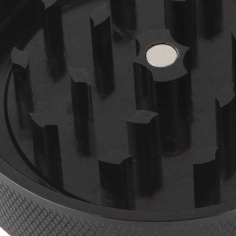 Close-up of Kannastör 2pc Pendant Grinder teeth, aluminum construction, ideal for travel