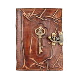 Embossed leather journal with metal key accent and secure latch, front view on white background