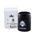 Kozo black UV glass storage jar in the 1/2 oz size with an airtight lid, front view on a plain white background