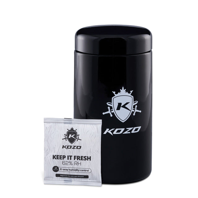 Kozo black UV glass storage jar in the 1 oz size with an airtight lid, front view on a plain white background