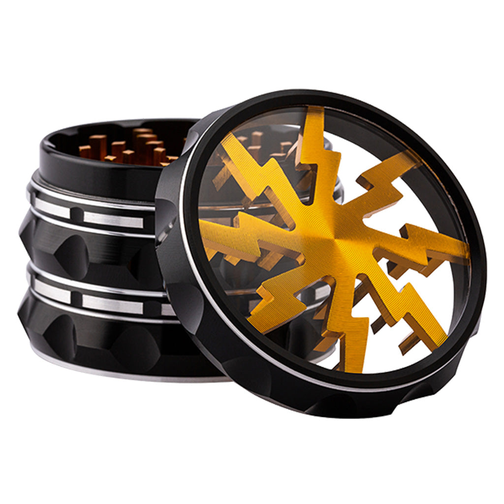 Kozo Lightning 2.5 inch grinder with a black body and gold lightning design, clear window lid tilted open