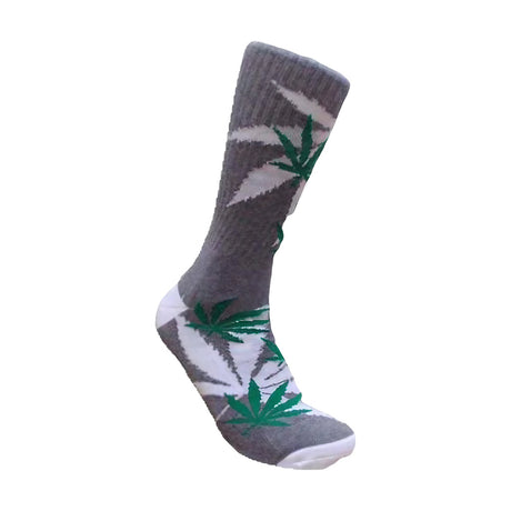 Leaf Republic Weed Socks with green cannabis leaf design on a white background, side view