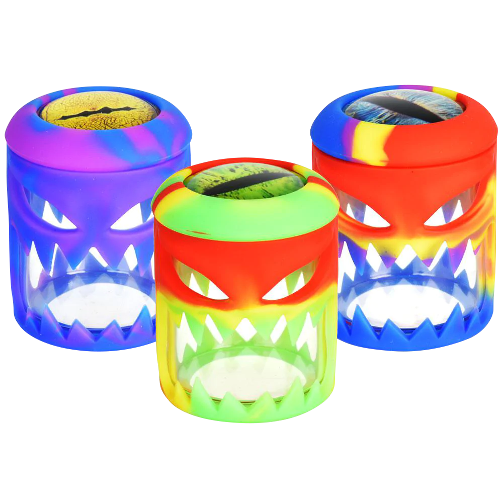 Trio of Lizard Eye Silicone Wrapped Glass Storage Jars in vibrant colors, front view on white background