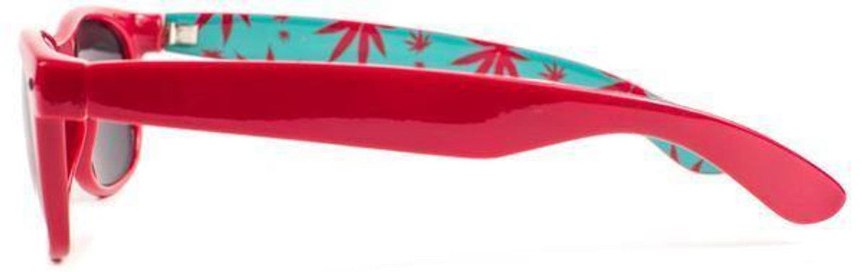 No Bad Ideas Cryptic Leaf Sunglasses with vibrant red frame and patterned arms, side view