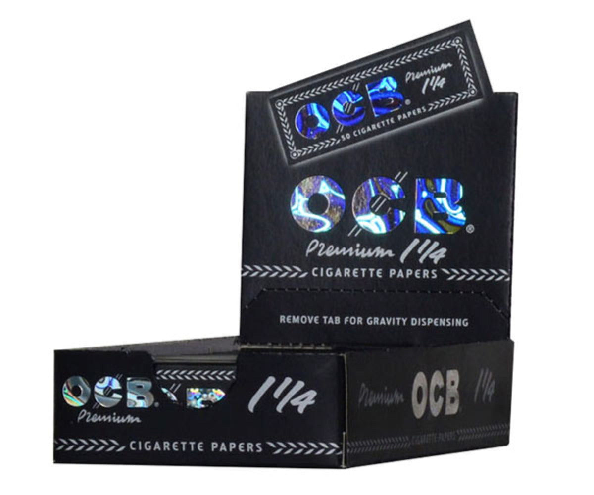 OCB Premium 1 1/4" Rolling Papers pack front view with gravity dispensing feature