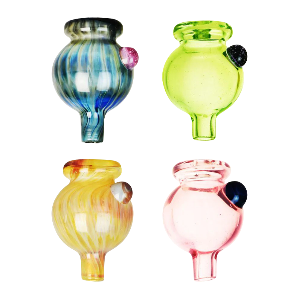 Assorted pastel 30mm borosilicate glass ball carb caps with marbles on white background