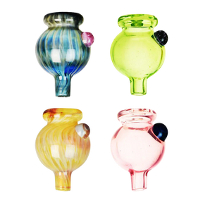 Assorted pastel 30mm borosilicate glass ball carb caps with marbles on white background