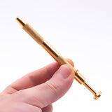 Close-up of The Stash Shack's Pearl Grabber Tool for concentrates, held in hand against white background