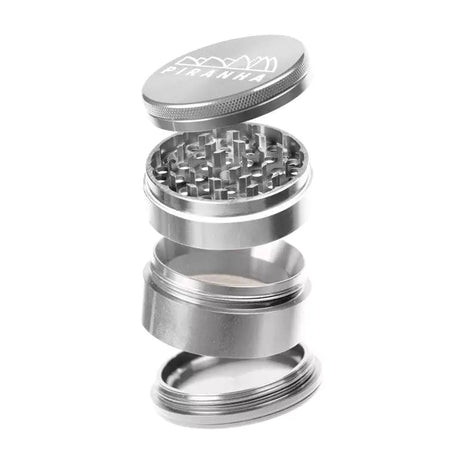 Piranha 2.0" Aluminum 4-Piece Grinder in Silver, Angled View with Sharp Teeth Visible