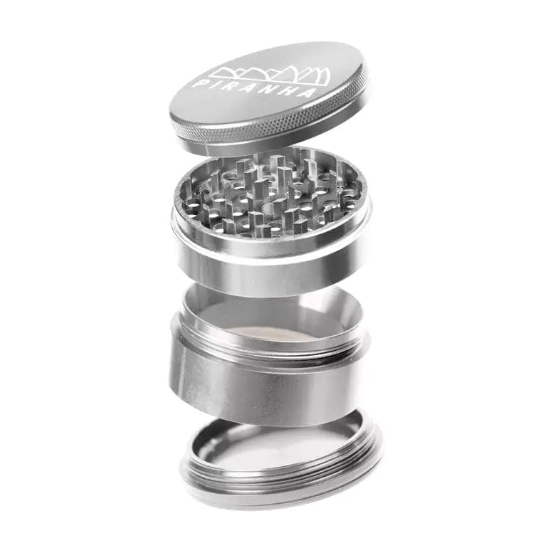 Piranha 2.0" Aluminum 4-Piece Grinder in Silver, Angled View with Sharp Teeth Visible