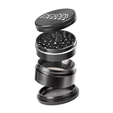 Piranha 4 Piece 2.5" Aluminum Grinder in Gun Metal, angled view with compartments open