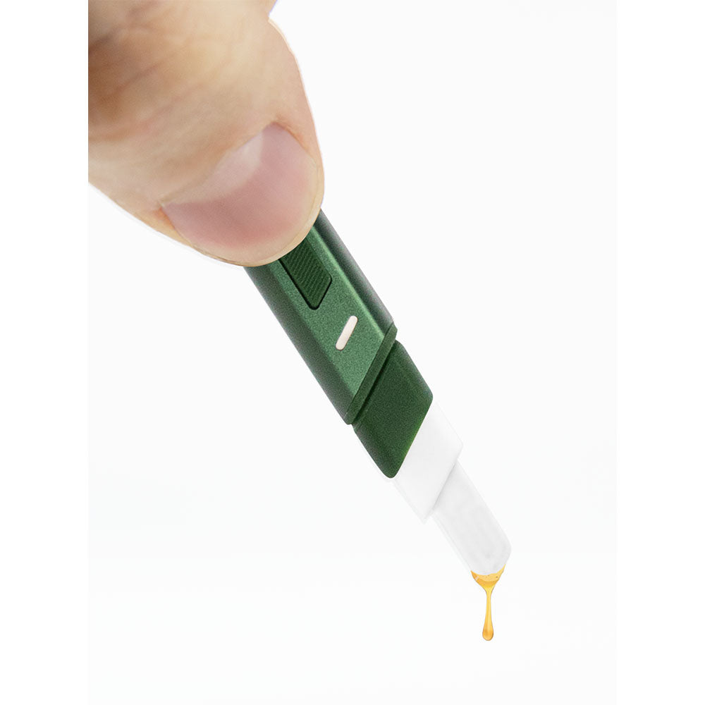 Puffco Hot Knife Electronic Heated Tool in use with concentrate, battery-powered, ceramic tip