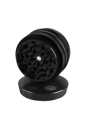 Pulsar 2" Black Aluminum 4pc Grinder, compact design with sharp teeth, ideal for dry herbs, angled view