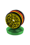 Pulsar 2" Aluminum 4pc Grinder in Rasta colors, top view showing sharp teeth for dry herbs