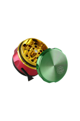 Pulsar 2" Carver 4-Piece Grinder in Rasta colors, compact design for easy travel, ideal for dry herbs.