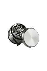 Pulsar 2" Carver 4-Piece Grinder in Silver Black, top view showing sharp teeth and smooth finish