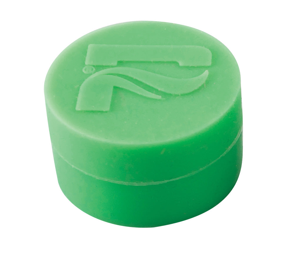Pulsar 35mm Silicone Container in green, top view, compact and durable stash storage
