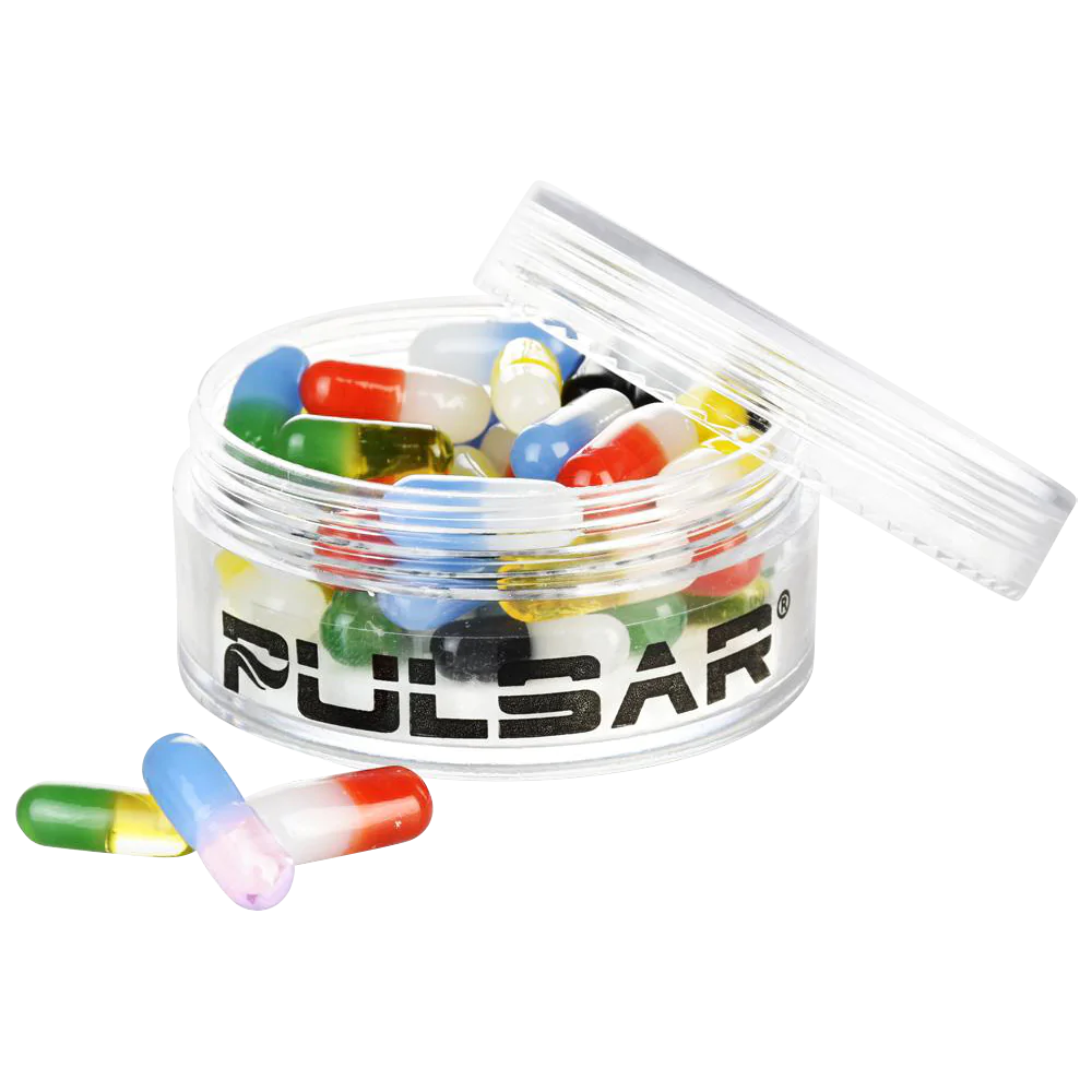 Pulsar Bicolor Glass Terp Pills in various colors, 50 pack, for dab rigs, displayed in clear jar