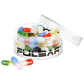 Pulsar Bicolor Glass Terp Pills in various colors, 50 pack, for dab rigs, displayed in clear jar