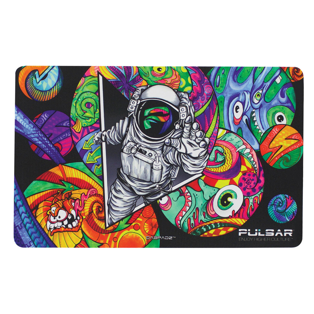 Pulsar DabPadz with vibrant astronaut design on rubber dab mat, top view