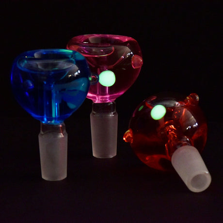 Pulsar Globular Glycerin Herb Slides in blue, pink, and red, 14mm, on black background
