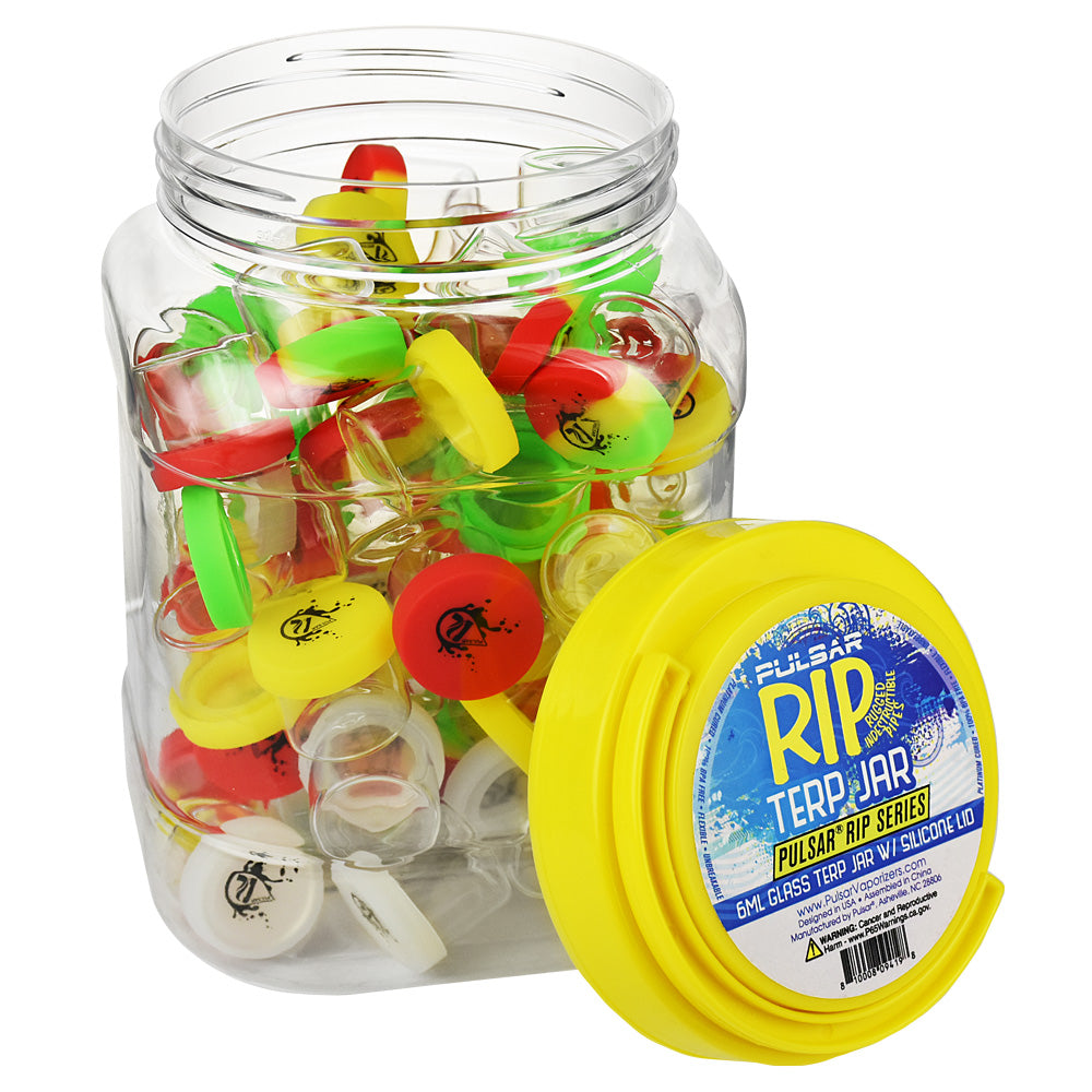 Assorted Pulsar RIP Series Glass Terp Jars in a clear container, compact and portable design
