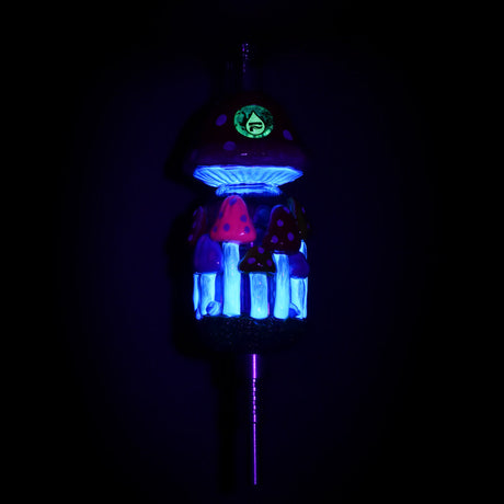 Pulsar Shroom Forest Vapor Vessel with Titanium Tip glowing in dark, front view