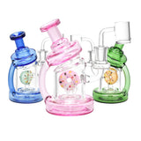 Pulsar Smoking Donuts Dab Rigs in blue, pink, and green with unique donut designs