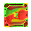Pulsar Tap Tray in Rasta colors, silicone rolling accessory, 5.25" square, top view