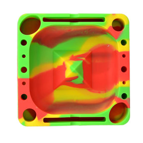 Pulsar Tap Tray in Rasta colors, silicone rolling accessory, 5.25" square, top view
