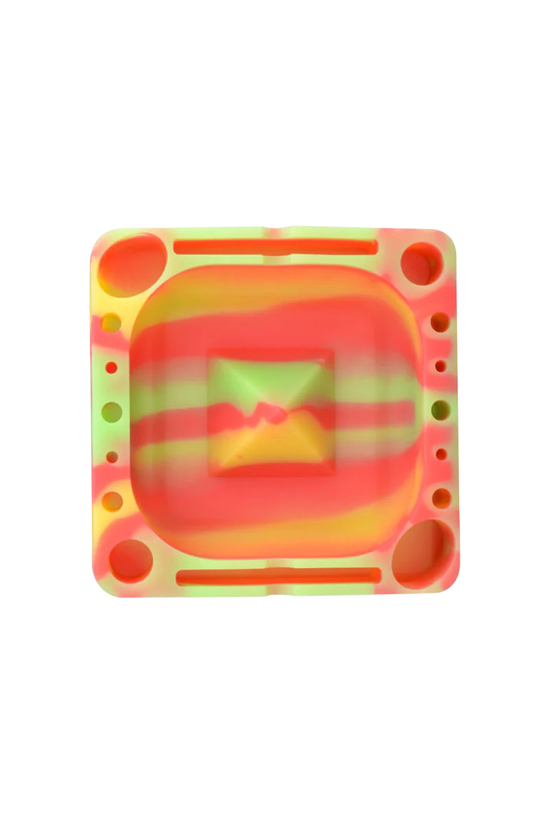 Pulsar Tap Tray in vibrant tie-dye silicone, top view, perfect for rolling and concentrates
