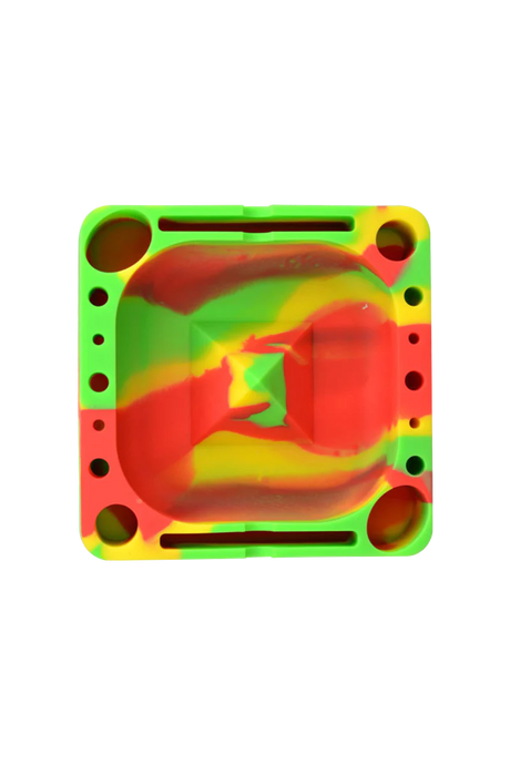 Pulsar Tap Tray in vibrant tie-dye silicone, top view, for dry herbs and concentrates