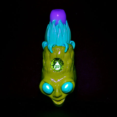 Pulsar Trippy Pineapple Hand Pipe with glow-in-the-dark features, front view on black background