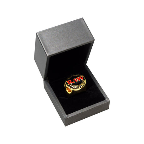 RAW Championship Double Cone Holder Ring displayed in an open black box, angled view