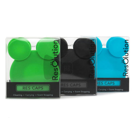 Resolution Caps in black, green, and blue, silicone bong cleaning accessories, front view