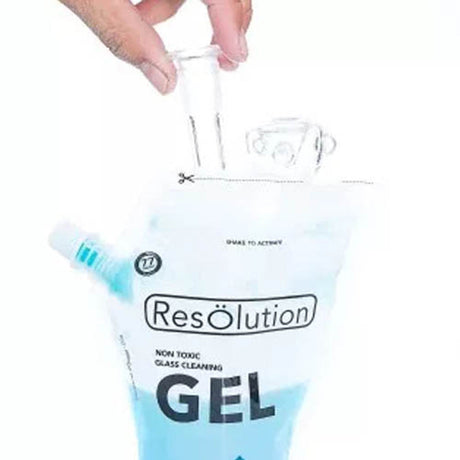 Hand pouring ResOlution Gel from closable silicone pouch for cleaning bongs and pipes