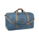 Revelry Supply Continental medium-sized rubber duffel bag in blue with comfortable straps, front view
