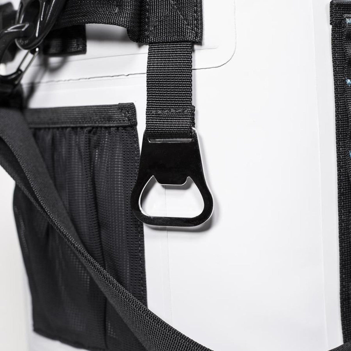 Close-up of Revelry Supply - The Captain 30 Soft Cooler Tote's durable strap and secure buckle.