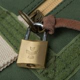Close-up of Revelry Supply's Continental Smell Proof Duffle with secure lock and logo detail