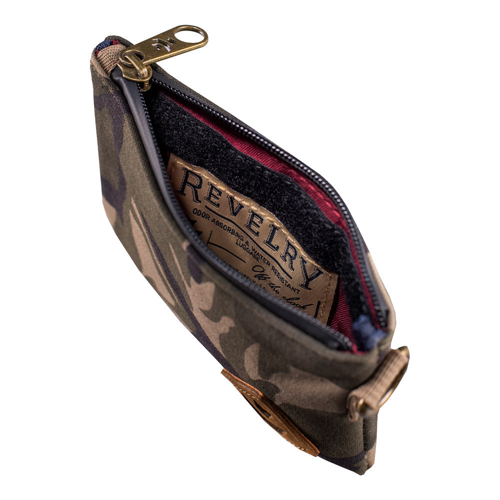 Revelry The Mini Broker Stash Bag in camouflage canvas, side view with zipper open